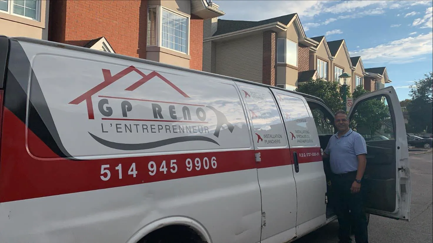 GP Reno owner standing next to the company work van